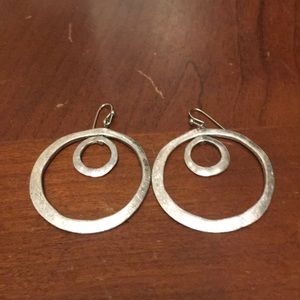 Silver dangling hoop in hoop earrings